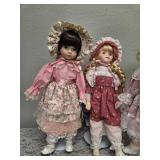 Three collectible porcelain dolls.  From the Premier Doll collection.