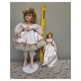 Vintage "Cinderella" collectible porcelain doll and Princess Diana collectible from the 1998 Manorville porcelain Collection.