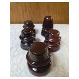 Five Vintage Brown porcelain/ceramic insulators used for telegraph or telephone lines.
