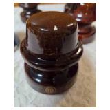 Five Vintage Brown porcelain/ceramic insulators used for telegraph or telephone lines.