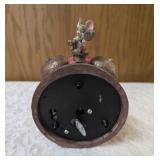 Vintage, hand painted resin musical clock with spinning hands featuring animated twirling mice, often sold as a decorative collectible or music box.  Check out you-tube video in photos.