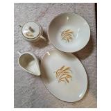 Vintage Homer Laughlin Golden Wheat set that includes a serving dish, serving bowl, sugar bowl and creamer. This set  likely produced in the 1950