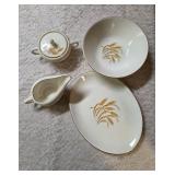 Vintage Homer Laughlin Golden Wheat set that includes a serving dish, serving bowl, sugar bowl and creamer. This set  likely produced in the 1950