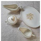 Vintage Homer Laughlin Golden Wheat set that includes a serving dish, gravy bowl, sugar bowl and creamer. This set  likely produced in the 1950