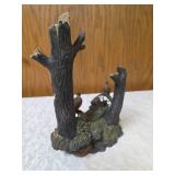 Three -Vintage Resin Figurines and 1 Pheasant on  Wagon Wheel Plate Holder.
