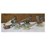 Three vintage collectible pheasant figurines made of ceramic or porcelain and three small pheasant figurines. Features hand painted details with a glossy finish.