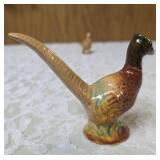 Vintage Rosemeade ceramic bird figurines that are salt and pepper shakers.  These figurines were made in Wahpeton ND by Rosemeade Pottery.