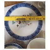 Vintage dinnerware set with 4 place settings is made by Thomson Pottery .  This set  is "Snowman Winterland Blue Sponge". Each place setting includes a dinner plate, salad plate, bowl and a mug.