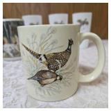 Seven misc. pheasant glassware/mugs.   Glasses are made of milk glass.  The rest are ceramic.
