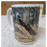 Seven misc. pheasant glassware/mugs.   Glasses are made of milk glass.  The rest are ceramic.