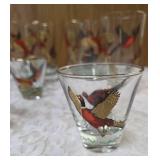 Eight vintage set of Hazel Atlas glassware in the Pheasant pattern, commonly found as part of Mid-Century Modern (MCM) barware sets and 3 shot glasses. Features flying pheasants in red, black and gold