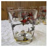 11 -Glasses - Misc., sizes.  Glassware is likely produced by the Hazel-Atlas Glass Company and  features the "Pheasants" pattern, produced roughly 1950
