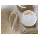 Misc. pieces -20 Dinner plates,12  salad plates, 1 saucer, 1 dessert plate , 1 gravy bowl, 17 coffee plates, 4 bread bowls.  Set of "Homer Laughlin Golden Wheat" dinnerware, featuring 22k gold trim an