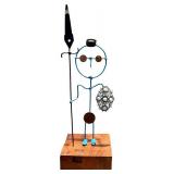 CB - Artisan-Crafted Wire Figure Sculpture with Coin Accents & Blue Filigree Brooch