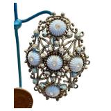 CB - Artisan-Crafted Wire Figure Sculpture with Coin Accents & Blue Filigree Brooch