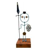 CB - Artisan-Crafted Wire Figure Sculpture with Coin Accents & Blue Filigree Brooch