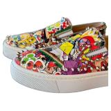 Christian Louboutin Graffiti-Print Studded Slip-On Sneakers - Made in Italy