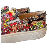 Christian Louboutin Graffiti-Print Studded Slip-On Sneakers - Made in Italy