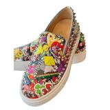 Christian Louboutin Graffiti-Print Studded Slip-On Sneakers - Made in Italy