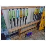 Rack with multiple tiki torches. Approx 10 to 12. As shown. CASH ON SITE ONLY. PICKUP IS MONDAY MAY 4TH FROM 11 AM TO 4 PM. REGARDLESS WHAT THE SCHEDULE STATES.