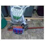 40 lb grass seed & hedge trimmer. As shown. CASH ON SITE ONLY. PICKUP IS MONDAY MAY 4TH FROM 11 AM TO 4 PM. REGARDLESS WHAT THE SCHEDULE STATES.
