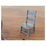 88-grams (total) Sterling Silver Miniature Collectibles - Coin-Top Patio Table, Rocking Chair and (2) Dining Side Chairs