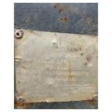 1989 Tandem-axle flatbed equipment trailer