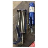 Caulk and caulk guns