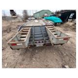 1989 Tandem-axle flatbed equipment trailer