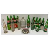 Group Of Vintage Soda Bottles Including 7Up, Mountain Dew, Tab, Coca-Cola And More