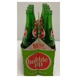 Group Of Vintage Soda Bottles Including 7Up, Mountain Dew, Tab, Coca-Cola And More