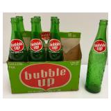 Group Of Vintage Soda Bottles Including 7Up, Mountain Dew, Tab, Coca-Cola And More