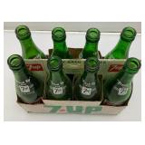 Group Of Vintage Soda Bottles Including 7Up, Mountain Dew, Tab, Coca-Cola And More