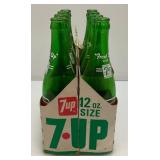 Group Of Vintage Soda Bottles Including 7Up, Mountain Dew, Tab, Coca-Cola And More