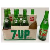 Group Of Vintage Soda Bottles Including 7Up, Mountain Dew, Tab, Coca-Cola And More