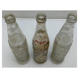 Group Of Vintage Soda Bottles Including 7Up, Mountain Dew, Tab, Coca-Cola And More