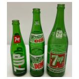 Group Of Vintage Soda Bottles Including 7Up, Mountain Dew, Tab, Coca-Cola And More