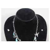 Silver Tone Charm Necklace with Turquoise Stones