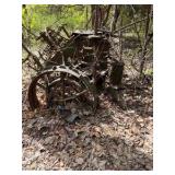LARGE cast iron farming equipment.