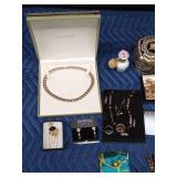 Flat of jewelry including 50