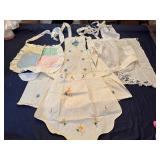 Three Vintage Handmade Adult Aprons and a Child