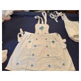 Three Vintage Handmade Adult Aprons and a Child