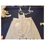 Three Vintage Handmade Adult Aprons and a Child
