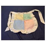 Three Vintage Handmade Adult Aprons and a Child