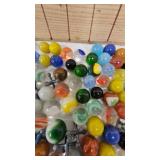 Vintage Tin and Marbles from 50