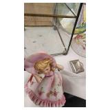 Round Metal Framed Pictures, glass display, porcelain figures