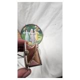 Round Metal Framed Pictures, glass display, porcelain figures