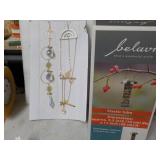 Hanging Sun Catchers and Bird Feede...