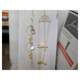 Hanging Sun Catchers and Bird Feede...