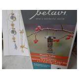 Hanging Sun Catchers and Bird Feede...